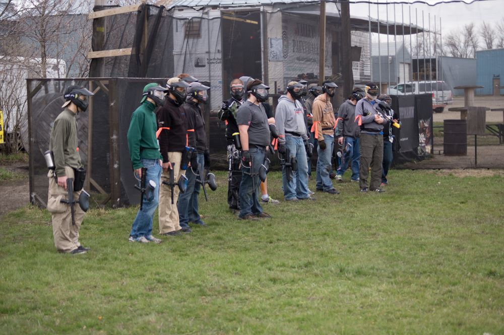 Then, they had each team form a line and face the opposing team. You can tell by the slumped shoulders none of us was very excited for this game.